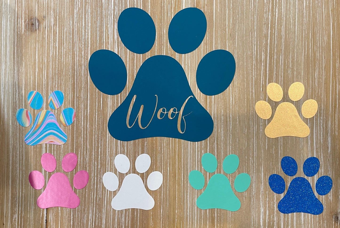 Paw Print with "Woof" cut out Window Decal
